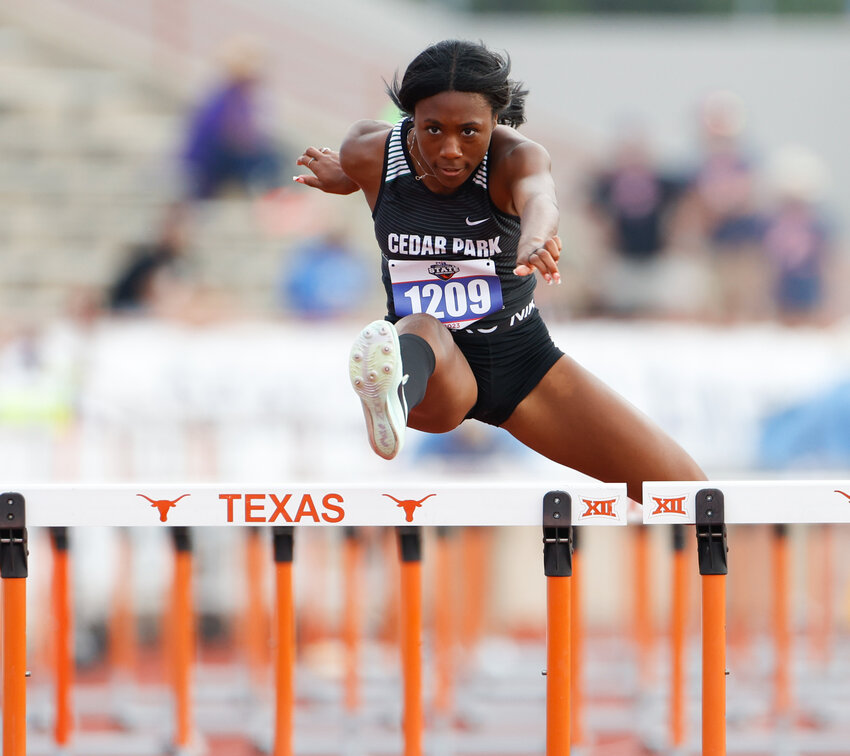 Amani Graham of Cedar Park High School (1209) competes in the Class 5A girls 100-meter hurdles during the UIL State Track and Field Meet on Thursday, May 11, 2023 in Austin.