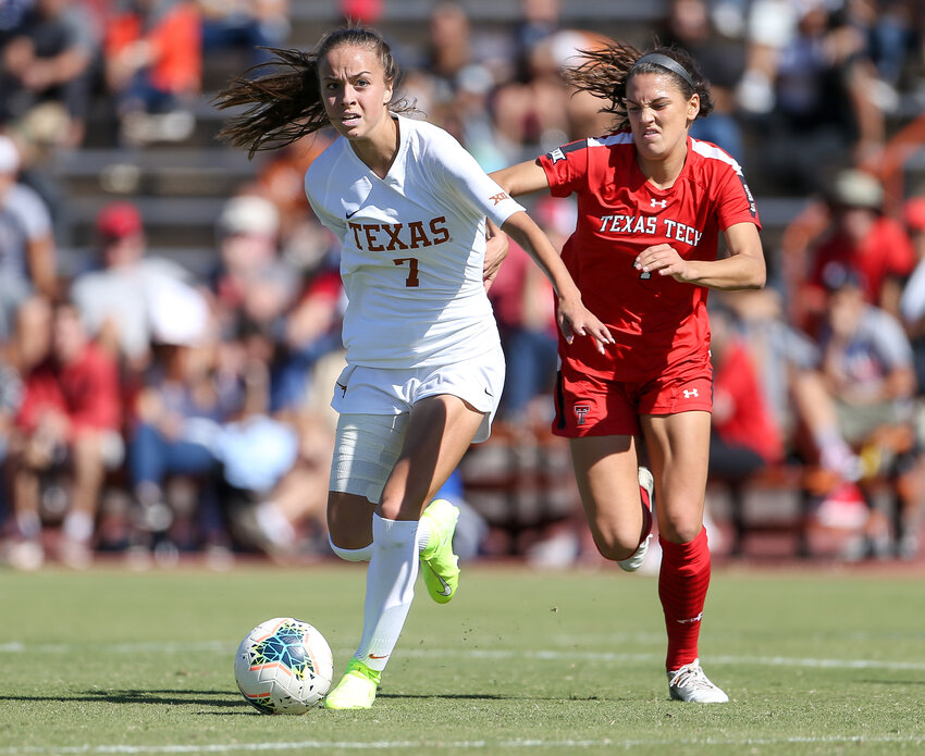 Former Texas Longhorns midfielder Julia Grosso (7) moves the ball during an NCAA women's soccer match between Texas and Texas Tech at Mike A. Myers Stadium in Austin, Texas, on Oct. 27, 2019.