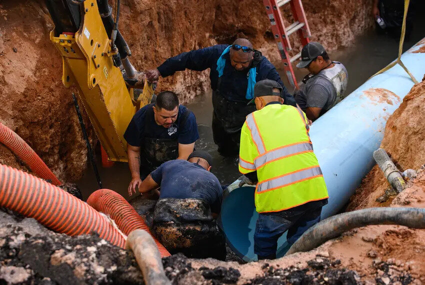 Odessa Water Distribution employees work through the night as they attempt to repair a broken water main on June 14, 2022 in Odessa. This summer's extreme heat and drought has wreaked havoc on municipal water lines throughout Texas.