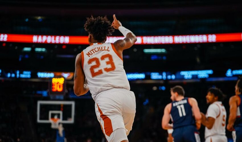 Texas forward Dillon Mitchell had a career-high 21 points in the Longhorns' 81-71 loss to UConn in New York City on Monday.