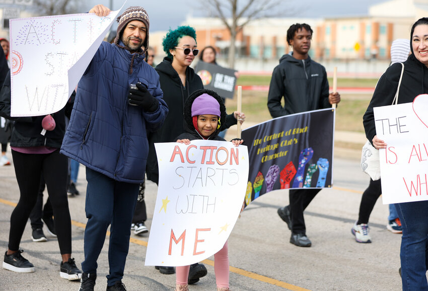 Dozens of local residents participated in a march celebrating Martin Luther King, Jr., on Saturday, Jan. 27, 2024. The parade had been rescheduled from Jan. 15 due to inclement weather.