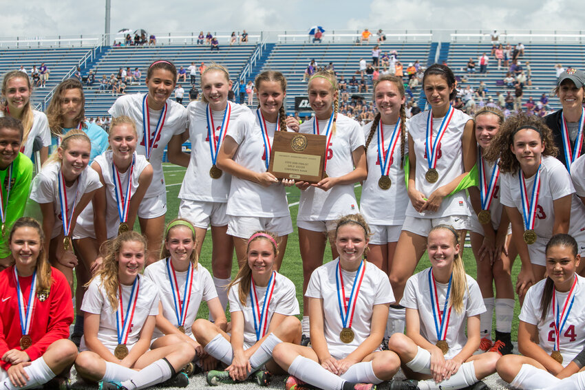 The Rouse Raiders hold their state semifinalist trophy following the Class 5A UIL girls soccer state semifinal game between the Rouse Raiders and the Aledo Bearcats at Birkelbach Field in Georgetown, Texas, on April 13, 2017. Aledo won 3-2 in overtime. The Rouse girls are returning to the state tournament this Thursday for a Class 5A semifinal match against Frisco Wakeland.