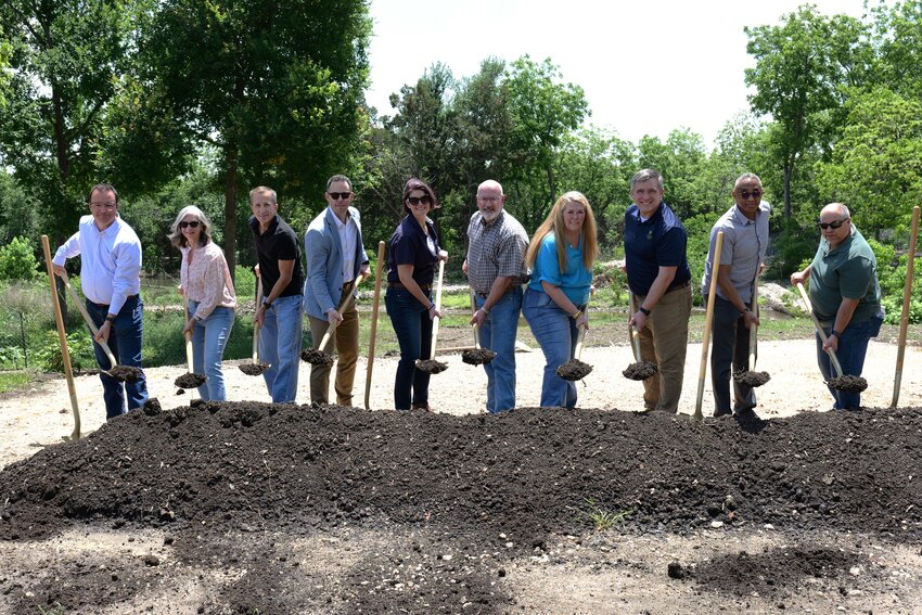 The City of Cedar Park held a groundbreaking ceremony on Monday, April 29, 2024, for Bell Park, the first notable portion of the $350 million Bell District to be completed so far. (Pictured, left to right) Cedar Park Type B Board members Justin OBrien, Ginger Goodin, Ryan Wood and Stephen Johnson and Cedar Park City Council members Heather Jefts, Eric Boyce, Anne Duffy, Cedar Park Mayor Jim Penniman-Morin, Kevin Harris and Mel Kirkland