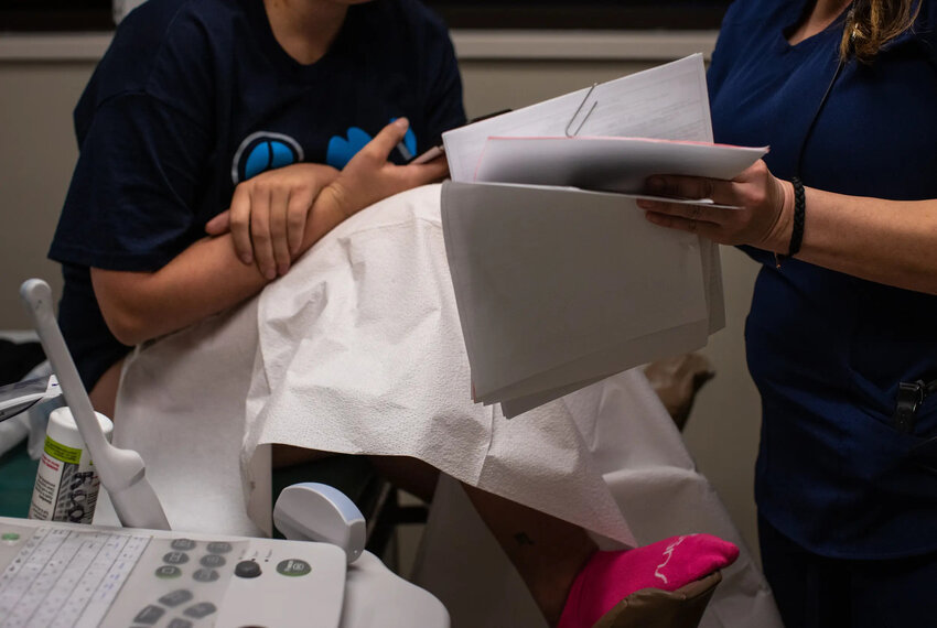 Hours after the U.S. Supreme Court overturned Roe v. Wade, a patient returns for a follow-up appointment to Alamo Women’s Reproductive Services abortion clinic in San Antonio on June 24, 2022.