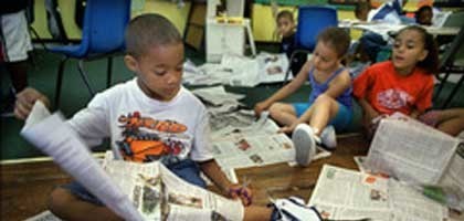 Students work on the Newspapers in Education summer reading challenge. Photo by PAUL CHAPLIN/The Patriot-News used with permission.