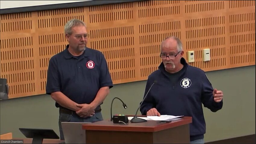 Retired firefighters Mike Simmons and Ray McDonald thanked the Olympia City Council for designating Olympia Firehouse 5 as Station 5.