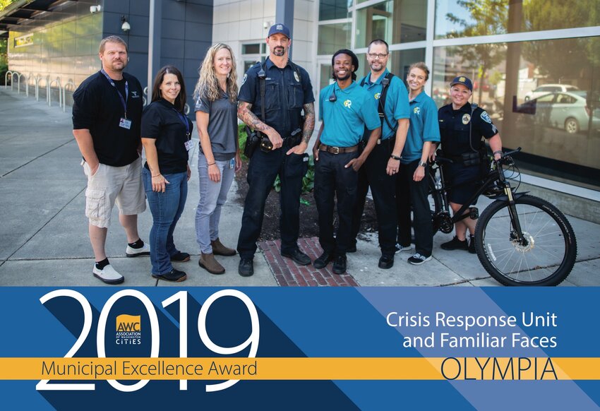 The Crisis Response Unit and Familiar Faces received the Municipal Excellence Award. From left to right. Keith Whiteman, Melissa McKee, Anne Larsen, Officer Javiar Sola, Christopher Jones, Eric Andersen, Aana Sundling, and Lt. Amy King, 2019.
