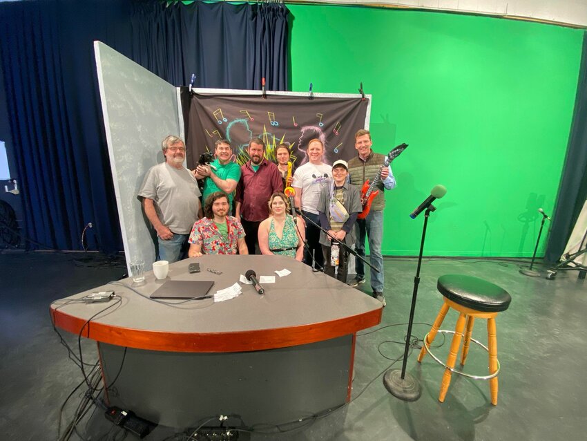 The Karaoke Oly team in studio, (from left to right) Eric Mahaffey, Luna Norrell (Dog), Robert Kam, Squin, Joe Neal, Kendall Meister, Cody Reed, Mike Tobias, Bran, Saint Bryan (King 5)