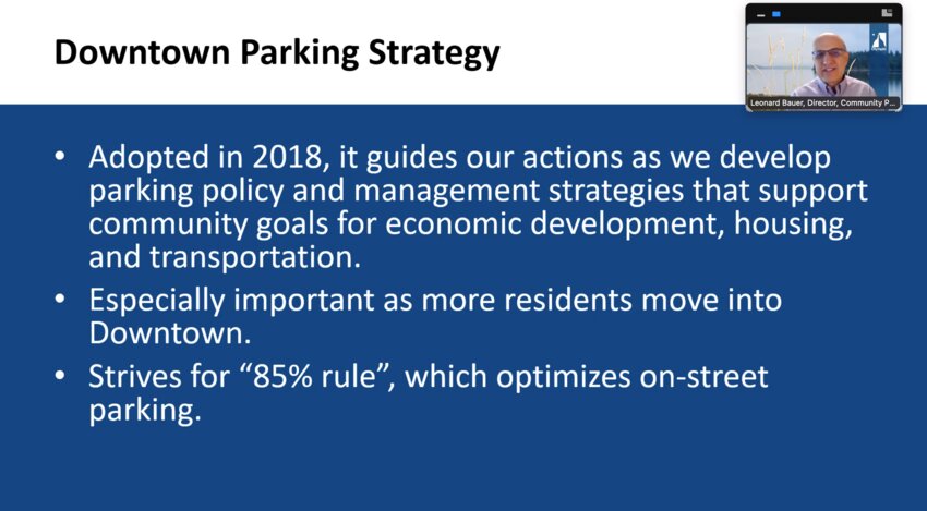 Director of Community Planning and Development Leonard Bauer explained the city’s downtown parking strategy for the convenience of local businesses and residential needs.