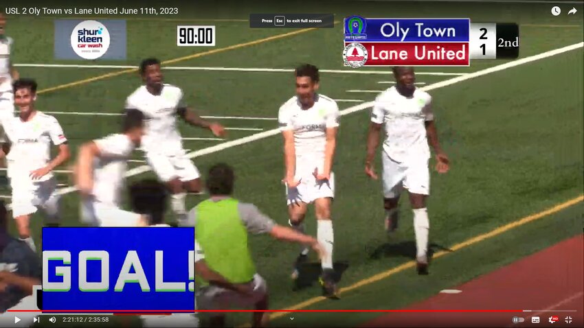 Super sub Dante Perez (in the middle) celebrates what could have been the winning goal for Oly Town against Lane United.
