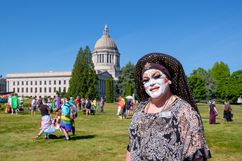 Sister Velma Mae Ormaynot, of the Sisters of Perpetual Indulgence, The Abbey of St. Joan, poses in front of the Washington State Legislative Building in advance of the Pride March in Olympia on July 1, 2023.