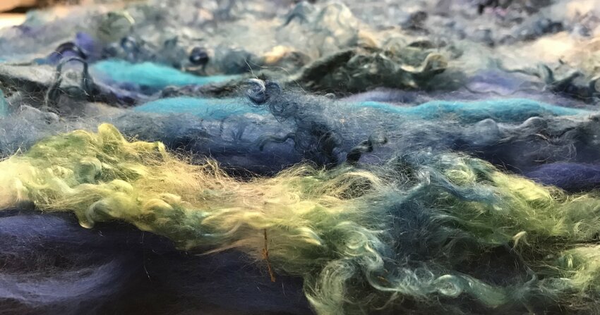 Textures and colors in a felted piece