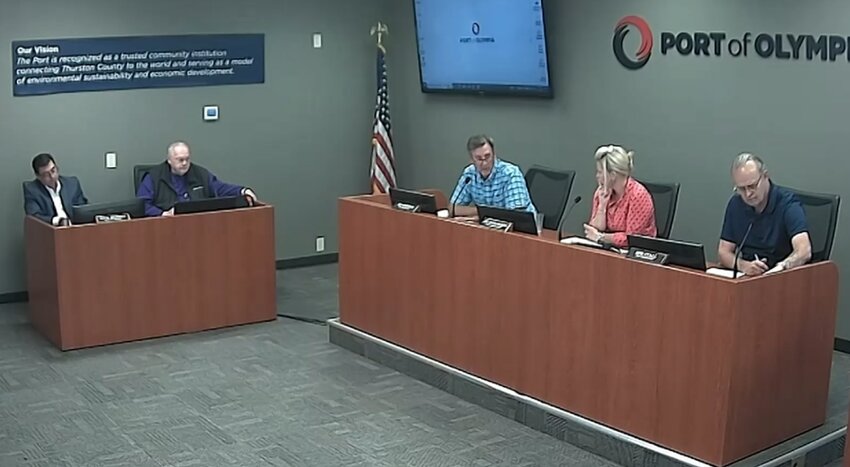 Port Acting Executive Director Rudy Rudolph (second to the left) reports to the Port Commission about the new owner of OYO Hotel and Comfort Inn.