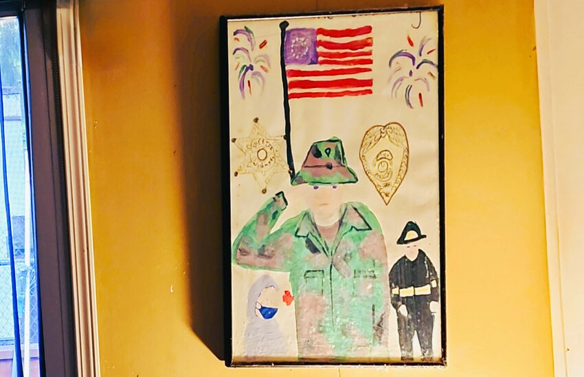 Darin’s son created this patriotic artwork as a child. It has a place of honor in the living room.  Sept. 10, 2023.