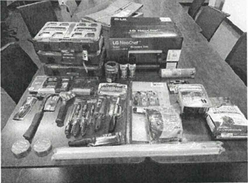 A surveillance camera still of the items in the suspect's cart.