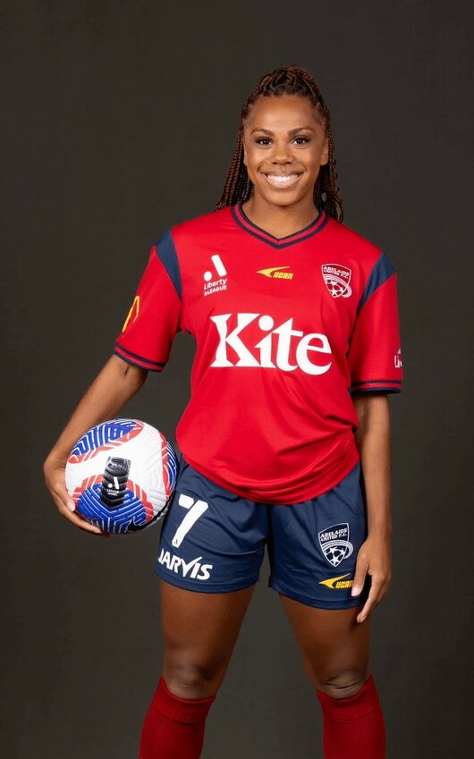 Mariah Lee poses as the latest Adelaide United signing