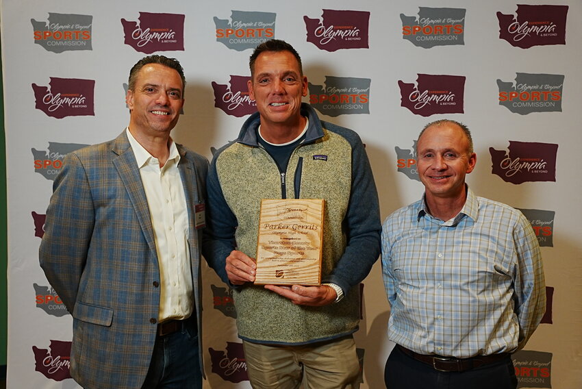 Sports Star of the Year Boys Sports – Jeff Bowe, Olympia & Beyond Sports Commission (Left) with Ryan Gerrits (Center), father of Parker Gerrits and Olympia Basketball Head Coach John Kiley (Right)