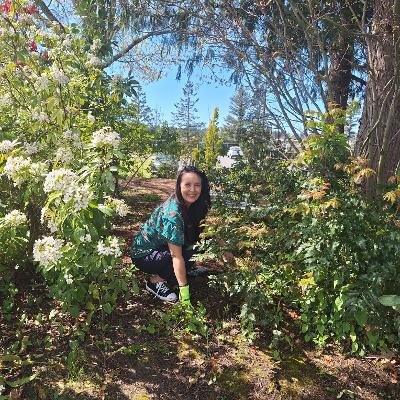 The Olympia Host Lions Club maintains this Sensory Garden for our low-vision and blind community. Pictured is Lisa Ikeda, Lions District Governor, on Earth Day.