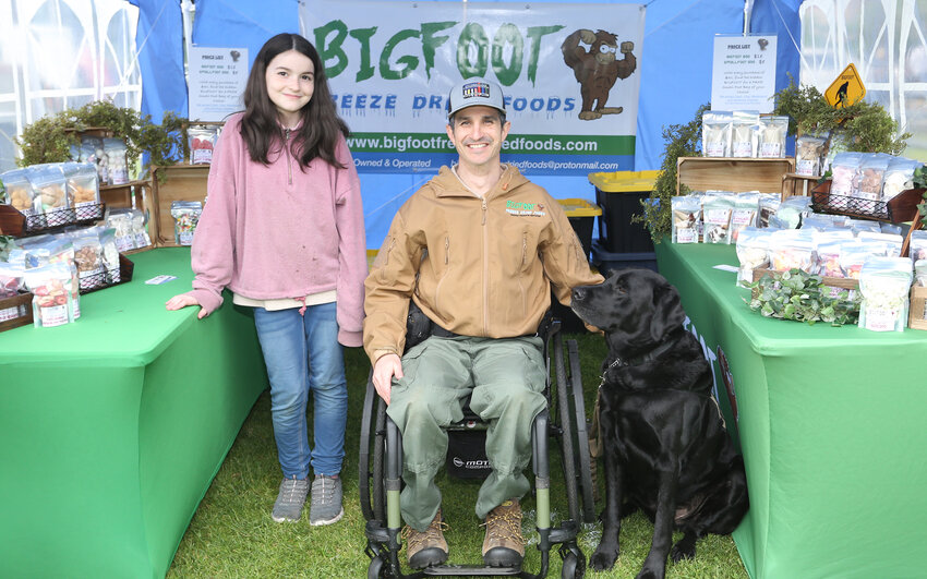 Veteran from the Army, Brian Willard owner of Big Foot, a dried food company, with Selah Willard (daughter and dog Ollie)