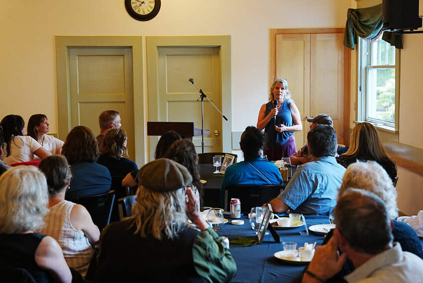 State Rep. Beth Doglio addresses the attendees of the Enterprise for Equity Dreams in Action event.