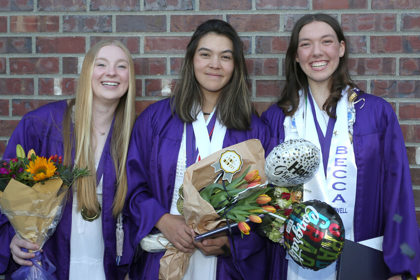NTHS Class of 2024 graduates Allyson Andrews, Sarah Towne, and Rebecca Howell celebrated with flowers, balloons, and smiles following their graduation.