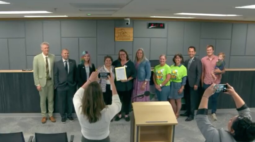 The Thurston County Board of Commissioners posed for a photo with the Thurston County Fair 2024 organizers during its public meeting on July 30, 2024.