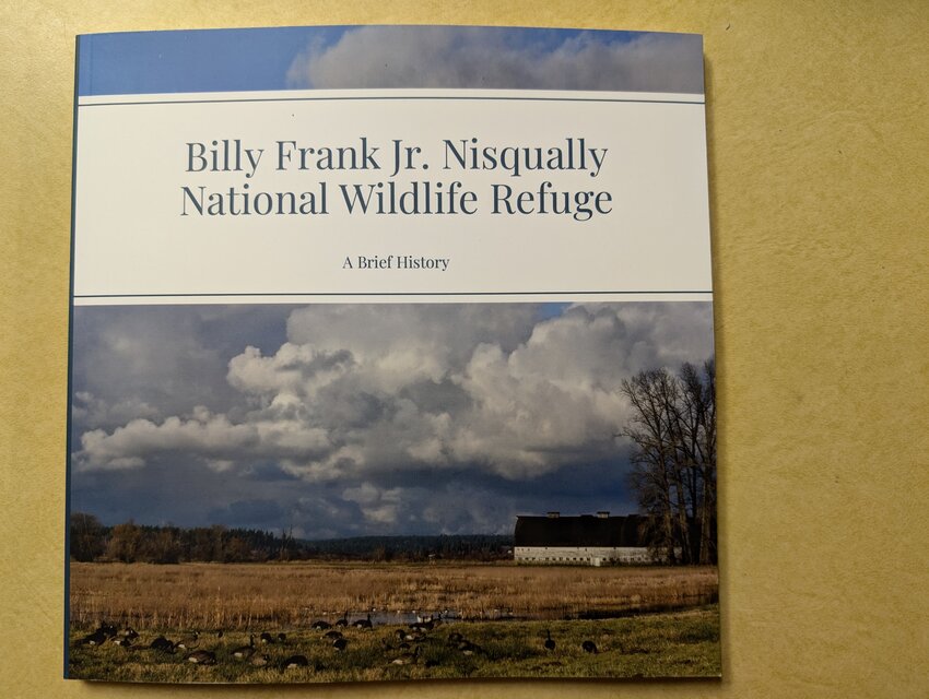 This is show the cover of "Billy Frank Jr. Nisqually National Wildlife Refuge: A Brief History," issued in honor of the 50th anniversary of the nature preserve.