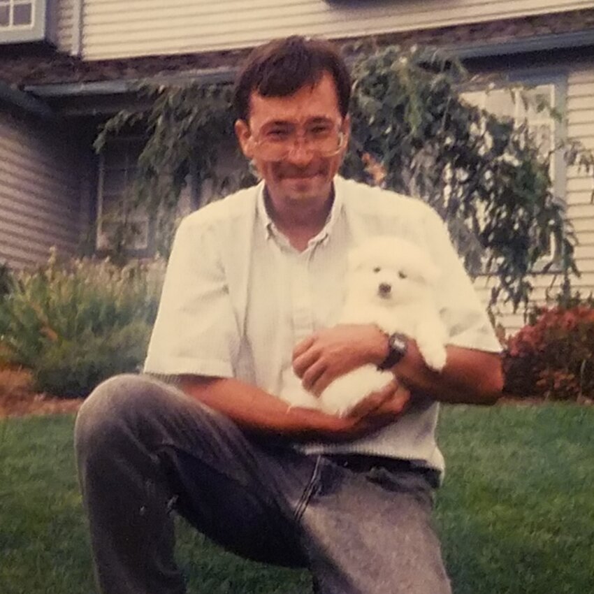 Thom holding Toshiro when he first brought him home