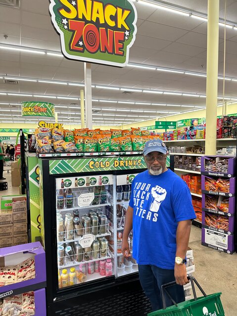 Jarvis Harris is loading up at the Snack Zone at Dollar Store in Yorktown, Va.