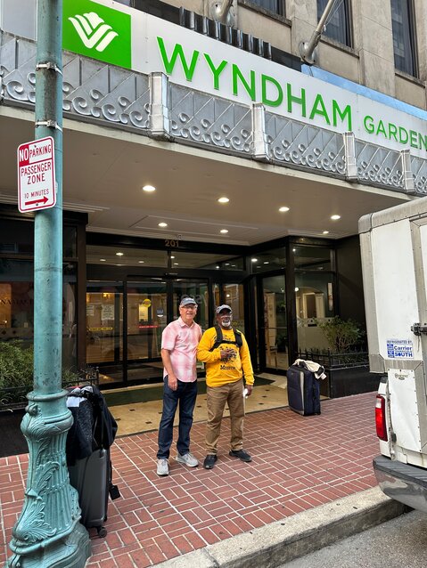 With our luggage outside of the Wyndham Garden Hotel as we headed back to the train station.