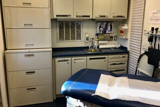 The exam room inside of the Mobile Health Clinic van.