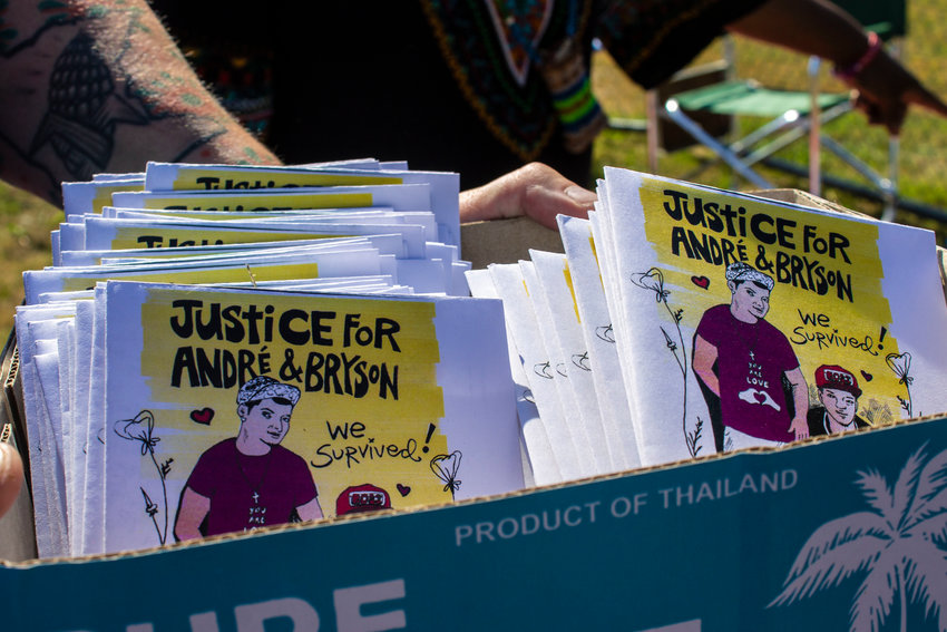 Pamphlets circulated at the &quot;Thrash Against Racism&quot; protest in Yauger Park on July 10 read &quot;Justice for Andre &amp; Bryson&quot; and &quot;We survived!&quot;