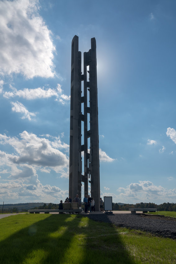 The &quot;Tower of Voices&quot; monument at the Flight 93 Memorial for 9/11 stands a symbolic 93 feet tall. It is an architectural musical instrument holding forty wind chimes, representing the forty passengers and crew members who perished on September 11, 2001, near the site in Shanksville, Pennsylvania.