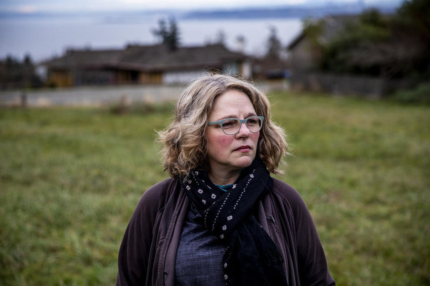 Cheryl Richmond near her home on Vashon Island on Dec. 7, 2020. Richmond saw her car insurance nearly double recently due to a drop in her credit score after missing two mortgage payments. She lost her job in February and, like most people, has been struggling to pay her bills during the pandemic. Washington Insurance Commissioner Mike Kreidler is proposing legislation that would cut the tie between credit scores and insurance rates, which would help ensure people like Richmond, who are struggling financially during the COVID-19 crisis, won&rsquo;t owe more money on their insurance.