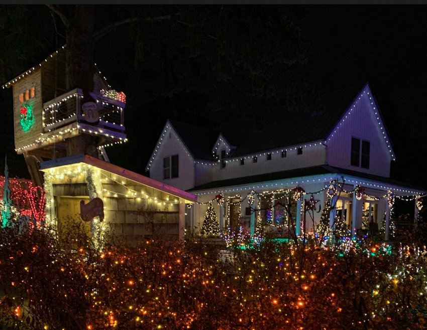 Whitney and Luke Bowerman convert their Eastside Olympia home to Oly Lightstravaganza every year in December.