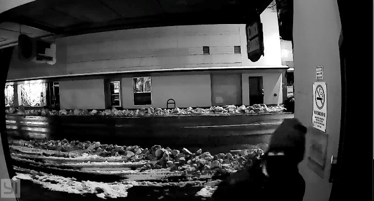 This image shows one of several camera angles that shows the lone burglar who broke into Olympia Gear Exchange on Feb. 15, 2021.
