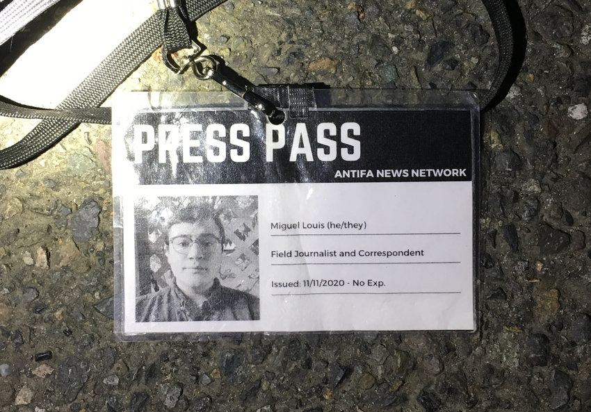 This &quot;PRESS PASS&quot; includes the words &quot;Antifa News Network&quot; and the name &quot;Miguel Louis (he/they).&quot;  Miguel Louis Lofland  was arrested on suspicion of failure to disperse.