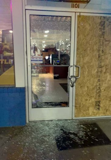 This is the front door of the Mobil convenience store at 1101 College St. SE in Lacey on Sunday, April 18, 2021 after it was broken into for the second time in two days.