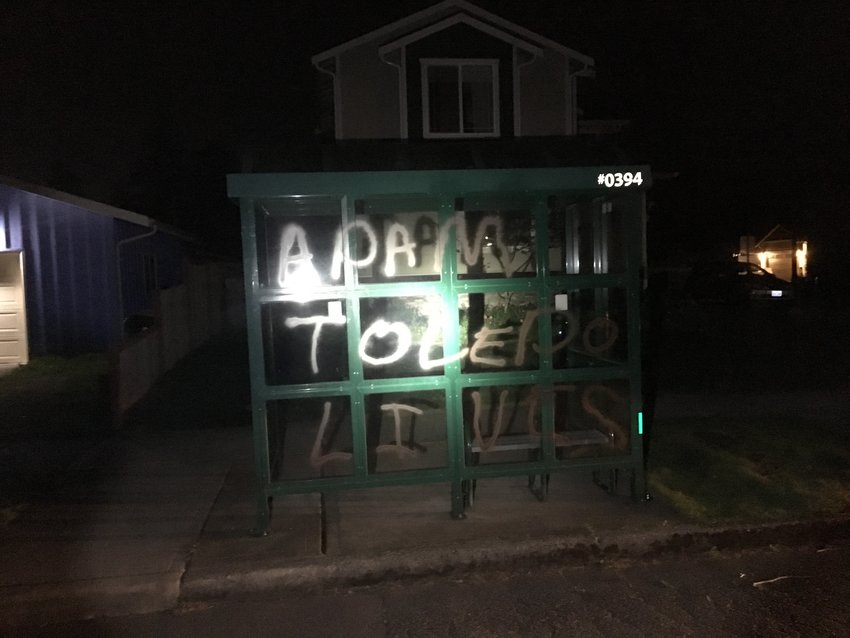This photo shows graffiti allegedly made on Fri., April 16, 2021 as part of a protest in west Olympia.