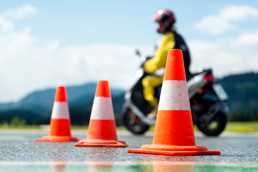 Specialized motorcycle safety training schools let inexperienced drivers crash into harmless traffic cones instead of actual traffic obstacles.