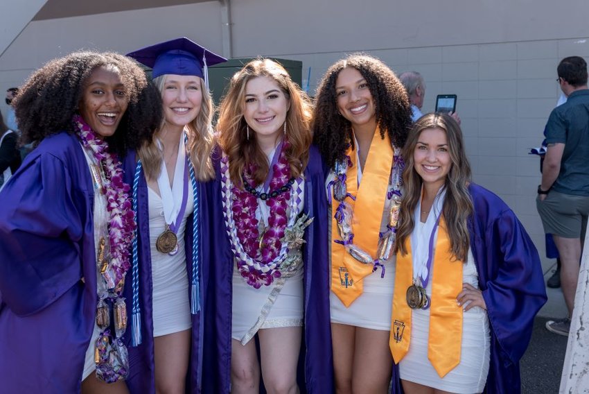 North Thurston High School graduates, l-r, Hannah Brannam, Maddie Hansen, Annie Hoffman, Cirena Adams, Helene Budd show off their various awards and honors on June 14, 2021 at their graduation ceremony, held at St. Martin's University.