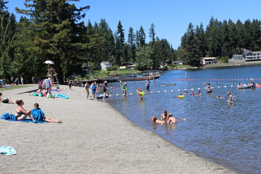 A view of the public swimming area at Long Lake in Lacey, in happier days when the water quality was better and lifeguards were on duty.
