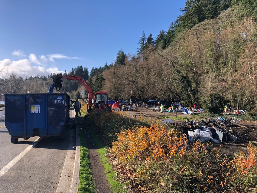 By 11 a.m. on Dec. 8, 2021, about 15% of the land being consumed by the homeless encampment on Deschutes Parkway was cleared.