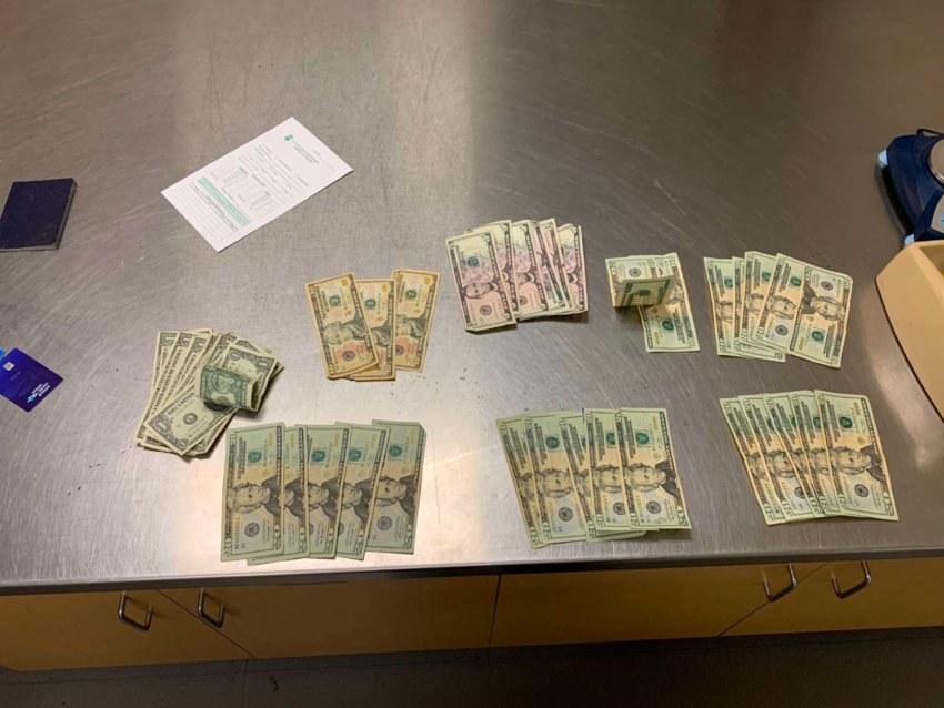 Olympia police reported finding this cash in the car that was in the possession of Sasha Marie Beell on Jan. 18, 2021.