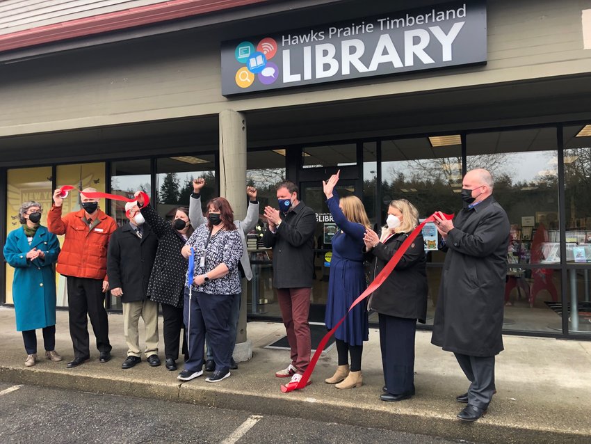 Visitors to the grand opening event were invited to sign the ribbon that was formally cut to open the Hawks Prairie Timberland Library on Feb. 18, 2022.