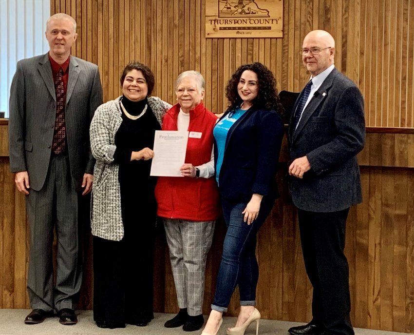 L-r: Thurston County Commissioners Tye Menser, Carolina Mejia, Zonta Club of Olympia representatives Pamela Dittloff and Lynda Nashed Zeman, and Commissioner Gary Edwards pose with Thurston Board of County Commissioners&rsquo; proclamation of Women&rsquo;s History Month on March 22, 2022.