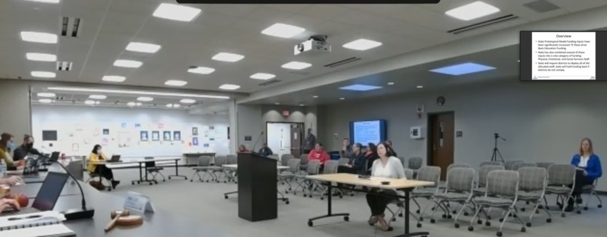 Olympia School District Assistant Superintendent of Finance and Operations Jennifer Priddy explains to the board the effect HB1664 in terms of physical, emotional and social services on April 24, 2022.