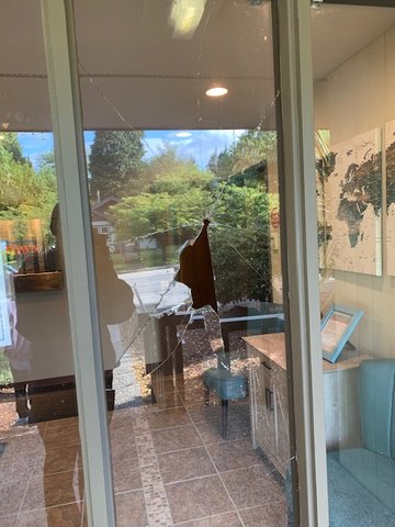 This is the window at the Hometown Property Management building that was broken by two men who attempted to set the building on fire on June 13, 2022.