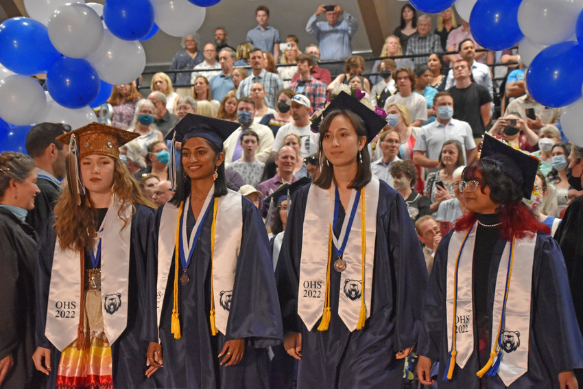 Olympia High School graduates (from left) Ella Sherin, Smriti Somasundaram, Whitney Sederberg and Liyana Alam take in the crowd before walking down the aisle at their graduation on June 21 at Saint Martin&rsquo;s University.