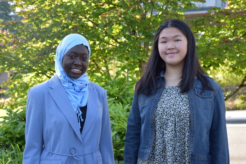 Rahma Gaye of Capitol High School (left) and Olympia High School&rsquo;s Christine Zhang (right).